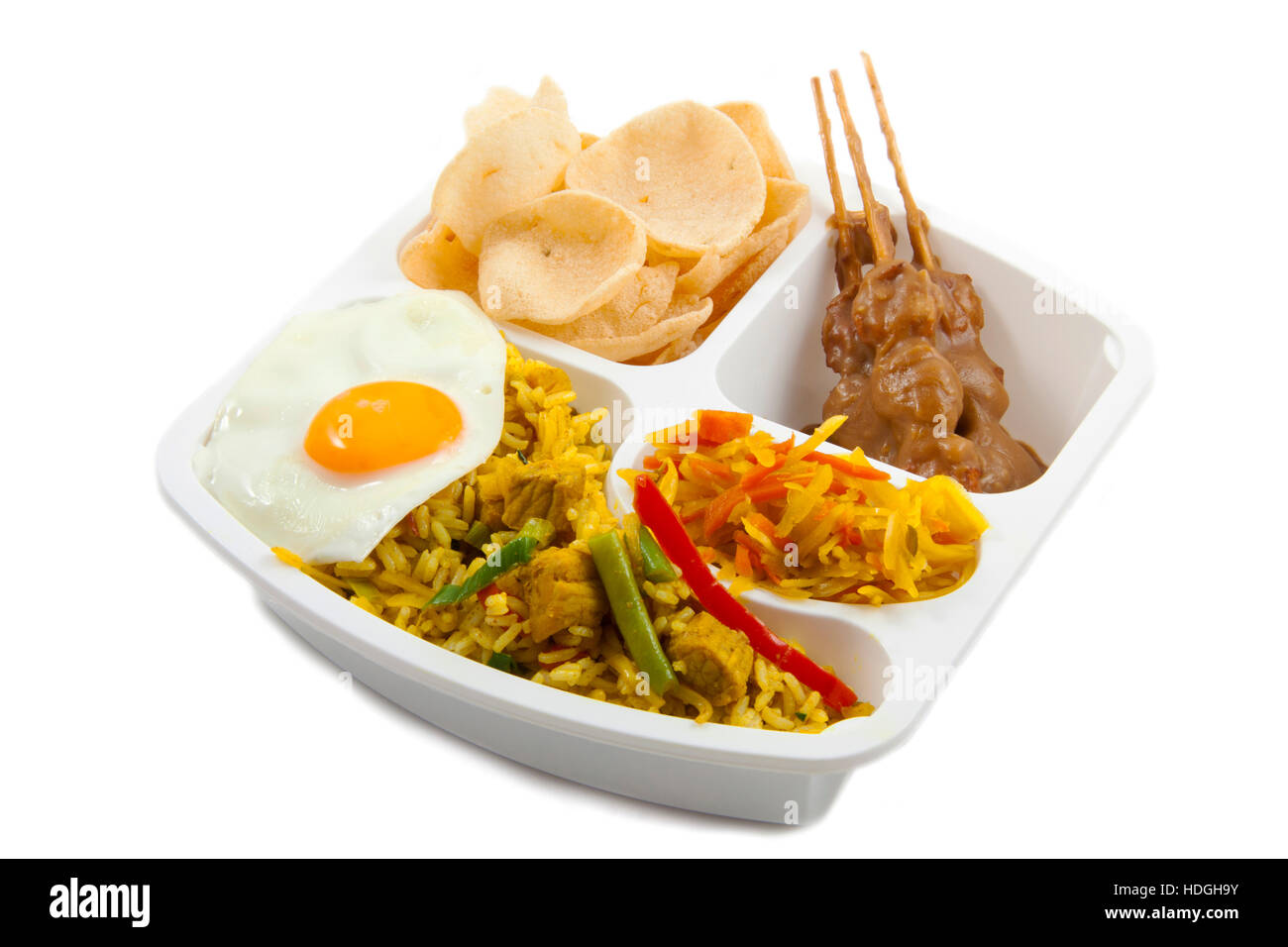Take away meal with indonesian food isolated over white Stock Photo - Alamy