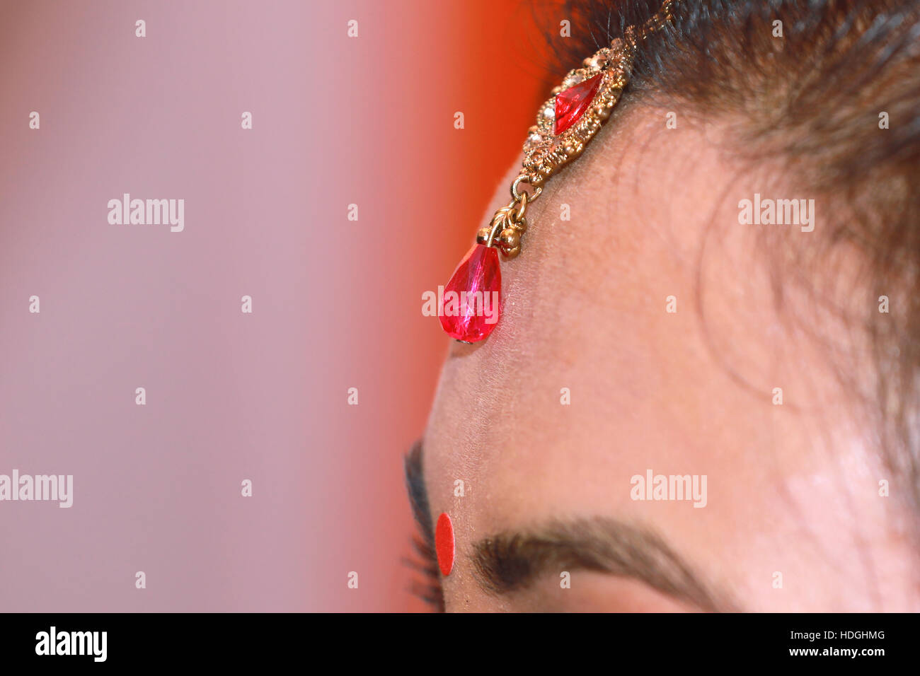 Bride wearing wedding jewellery closeup Stock Photo