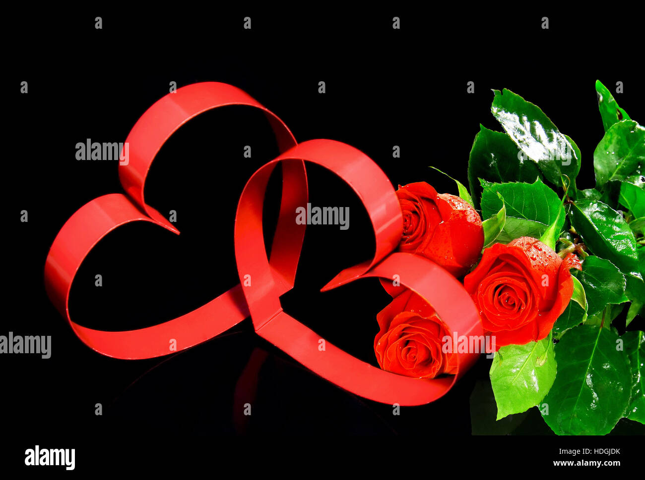 Intertwining roses hi-res stock photography and images - Alamy