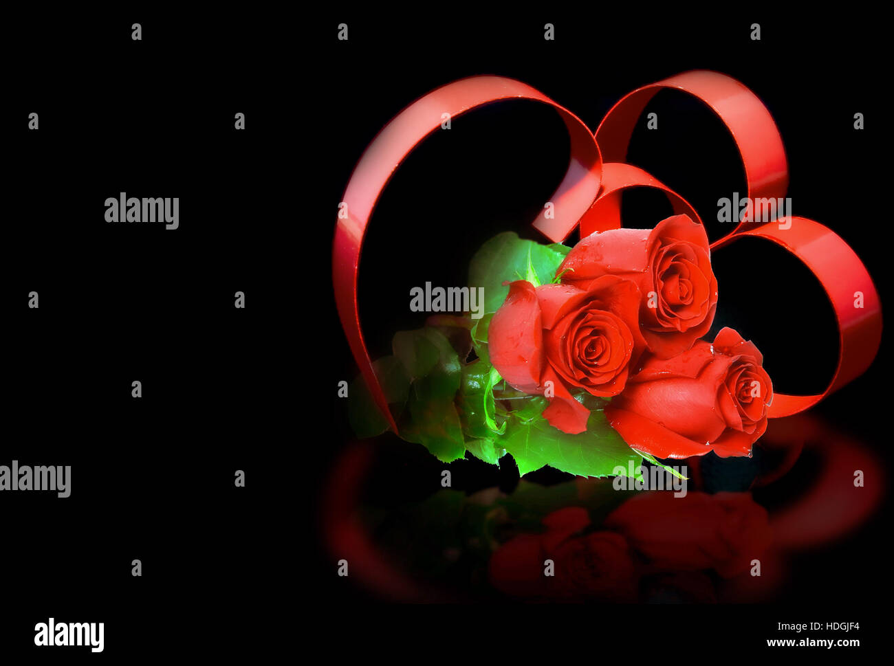 St. Valentine Day. Intertwining of two hearts, on black background with ...