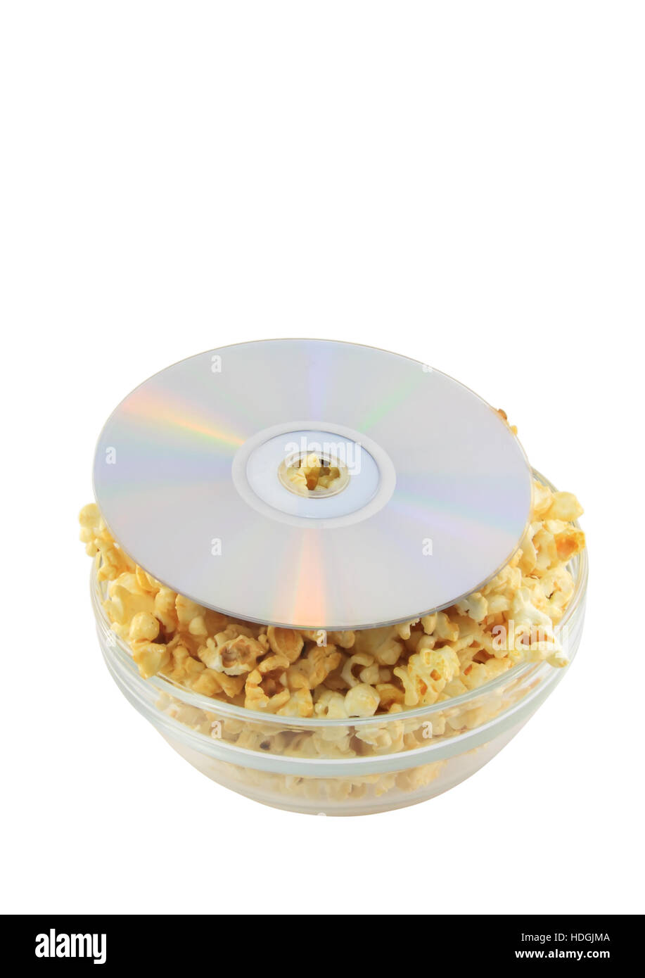 Bowl full of caramel popcorn with DVD disk . Isolated Stock Photo