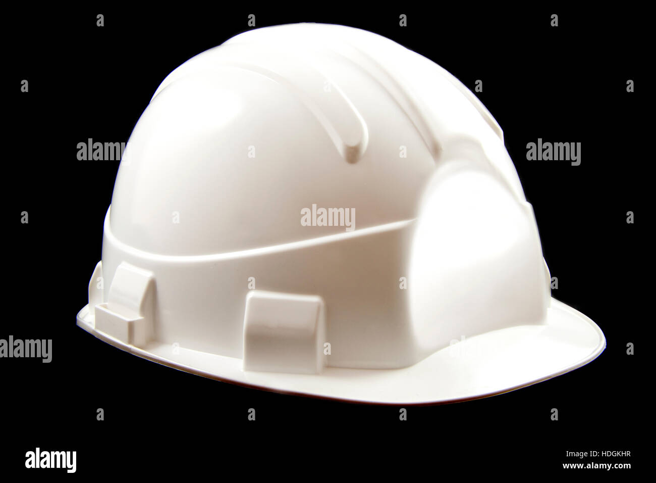 White protection helmet isolated over black Stock Photo