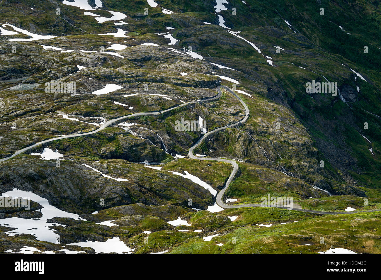 Curved road in the rocks of Norway. Stock Photo