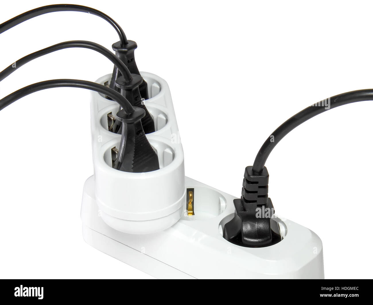 Plugs in electric socket. Isolated over white Stock Photo Alamy