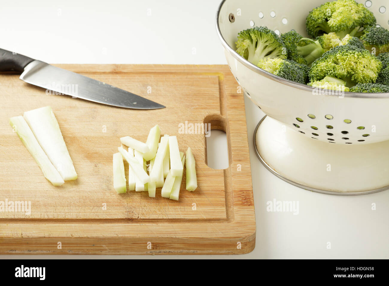 broccoli and stalk - preparing the broccoli stalk for cooking Stock Photo