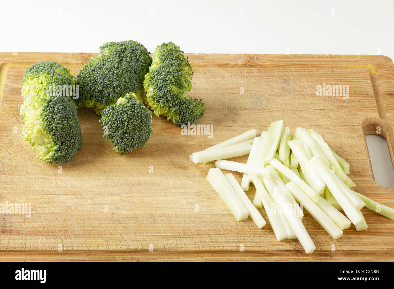 broccoli and stalk - preparing the broccoli stalk for cooking Stock Photo
