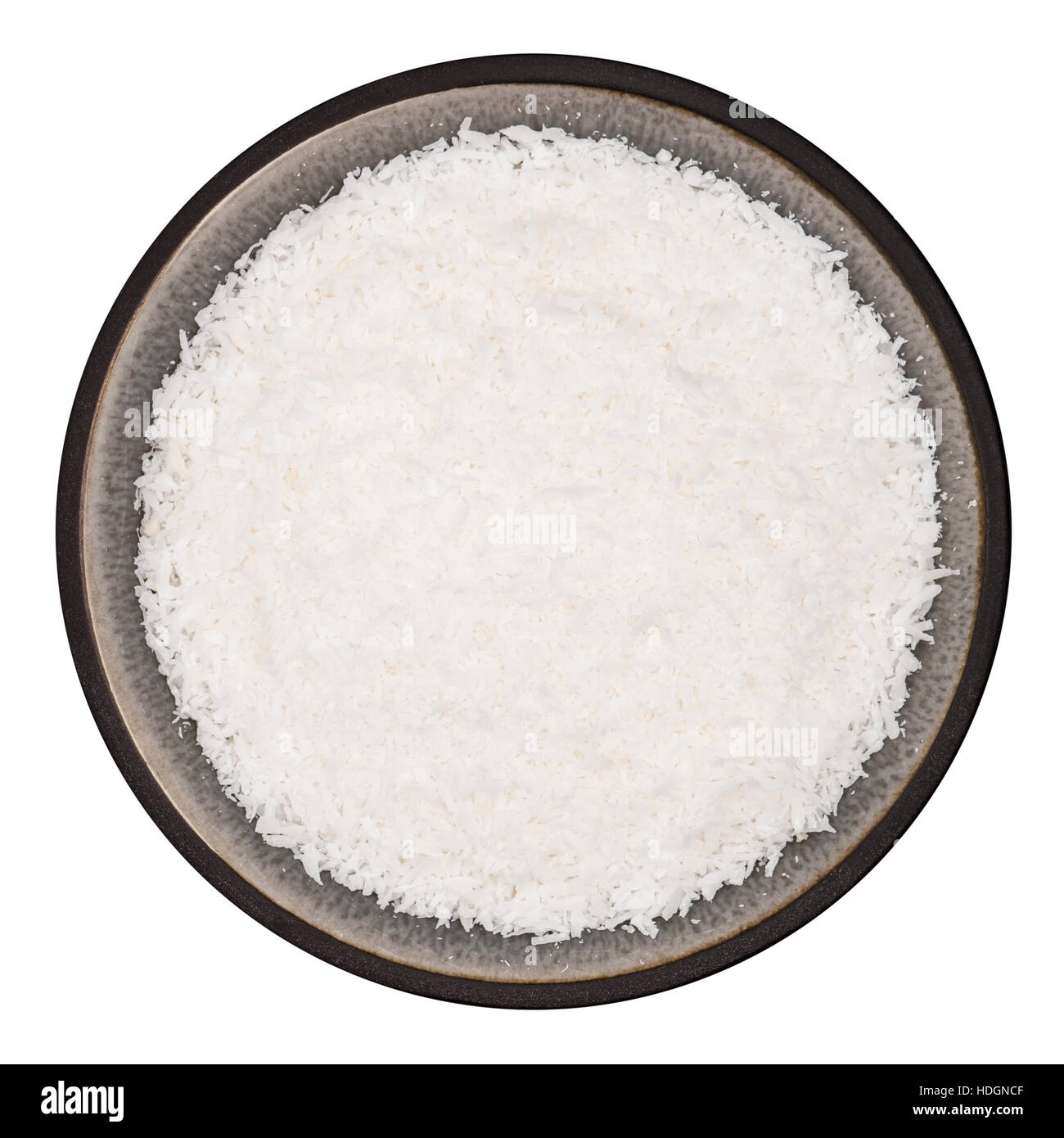 Organic Grated Coconut in Bowl Isolated Top Stock Photo