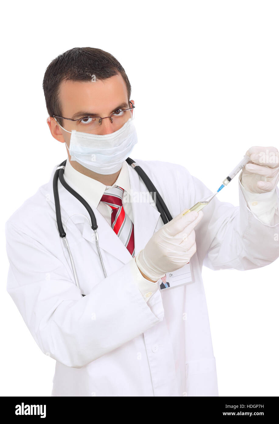 Doctor fill syringe medication from ampule. Isolated over white Stock