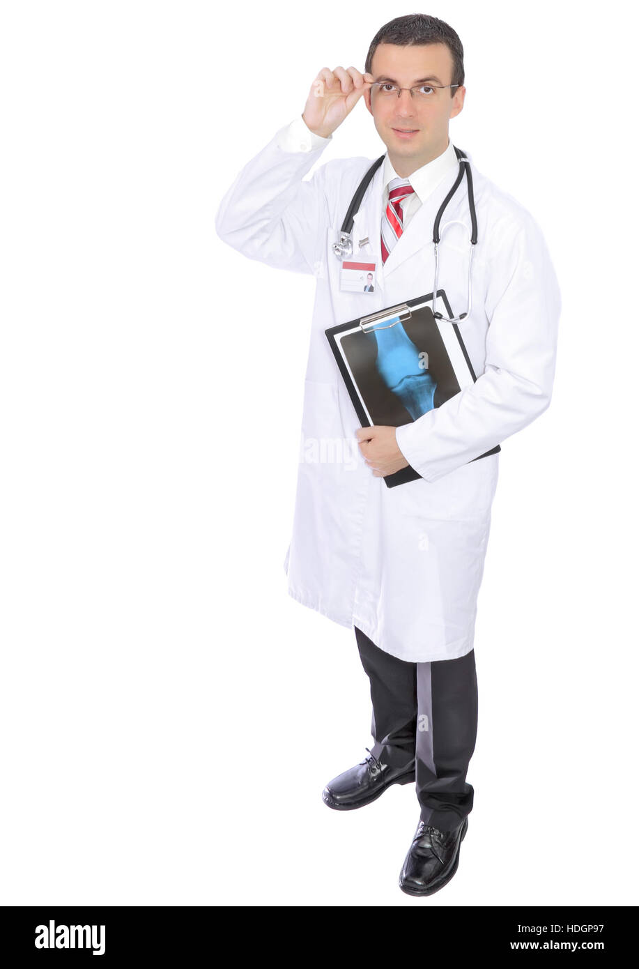 Friendly medical doctor stand with a xray image and medical pad
