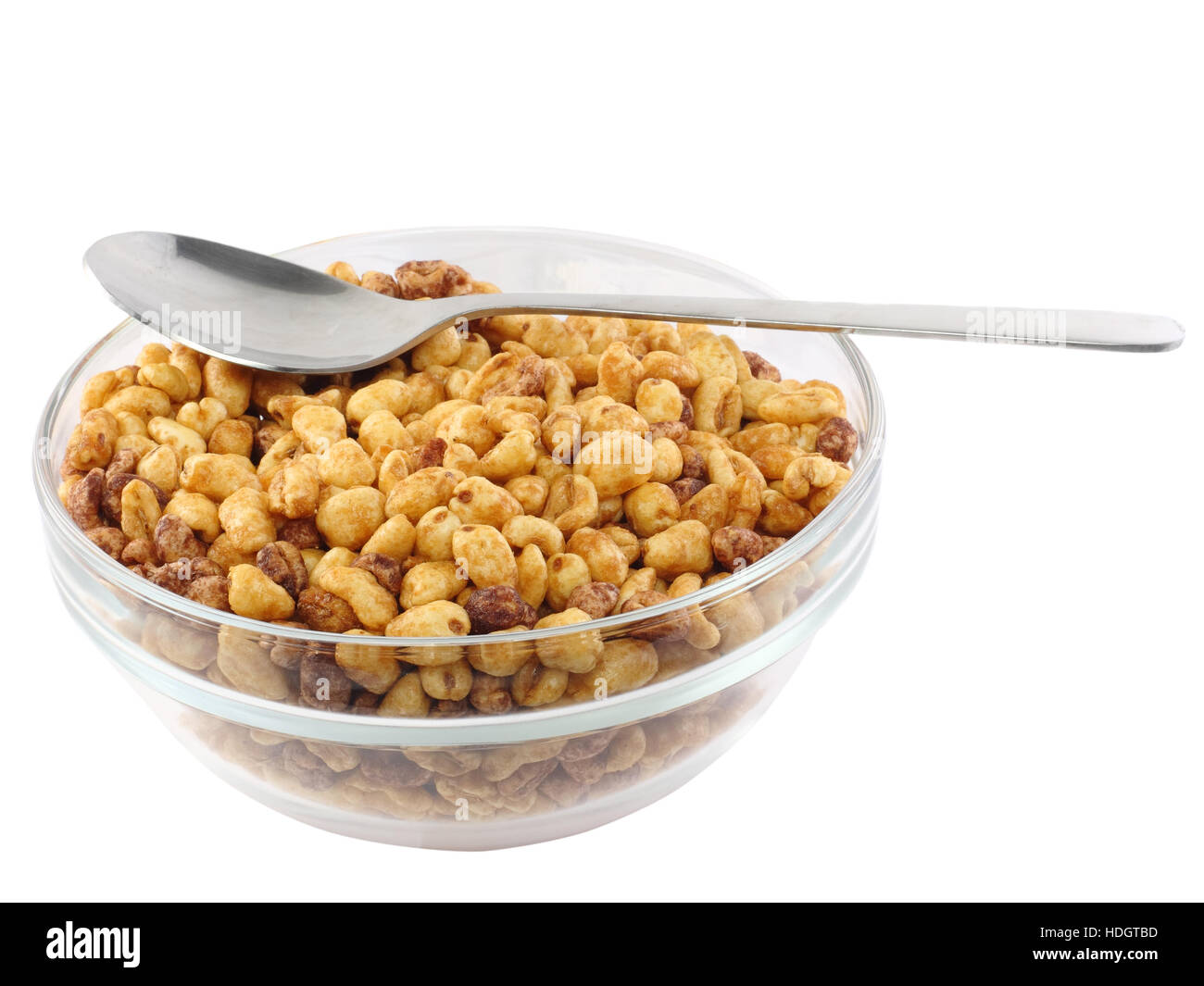 Glass bowl with cold cereal flakes. Isolated over white Stock Photo Alamy