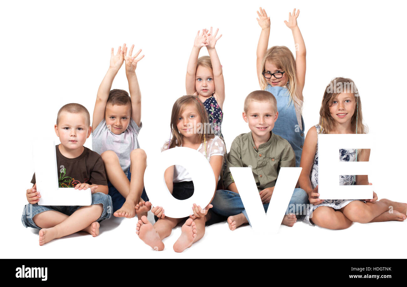 Children holding inscription love Stock Photo