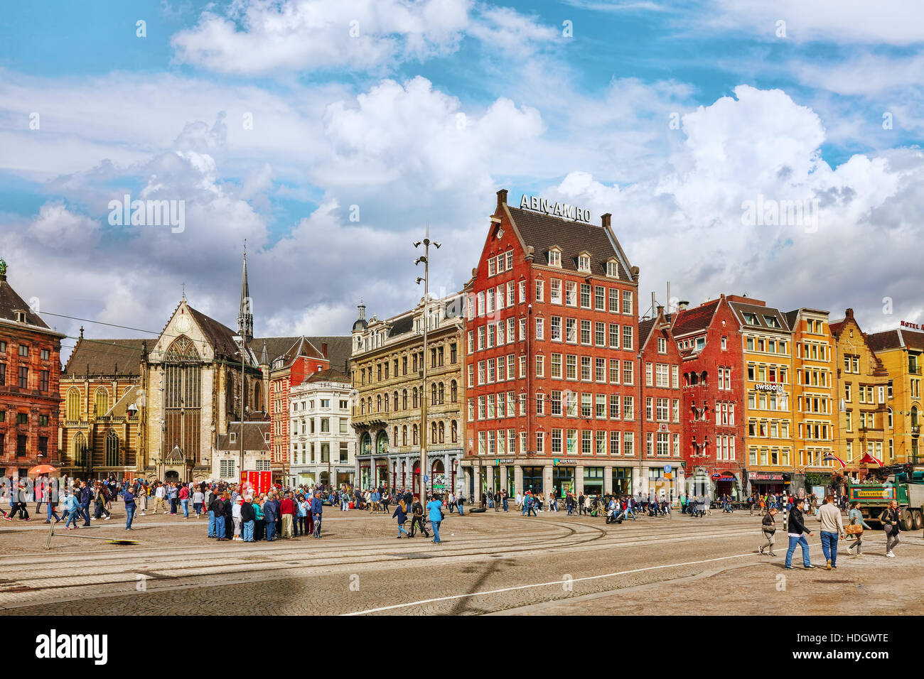 AMSTERDAM, NETHERLANDS - SEPTEMBER 15, 2015: Beautiful Amsterdam, people in the centre of  Dam Square in the daytime.Square is a central place for loc Stock Photo