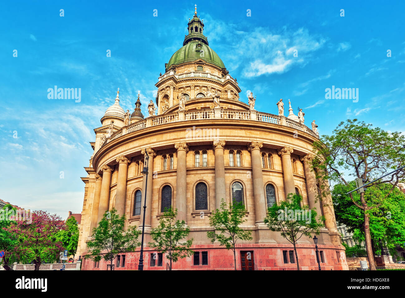 BUDAPEST, HUNGARY-MAY 04, 2016: St.Stephen Basilica in Budapest at daytime. Side View from street with car's and people. Hungary Stock Photo
