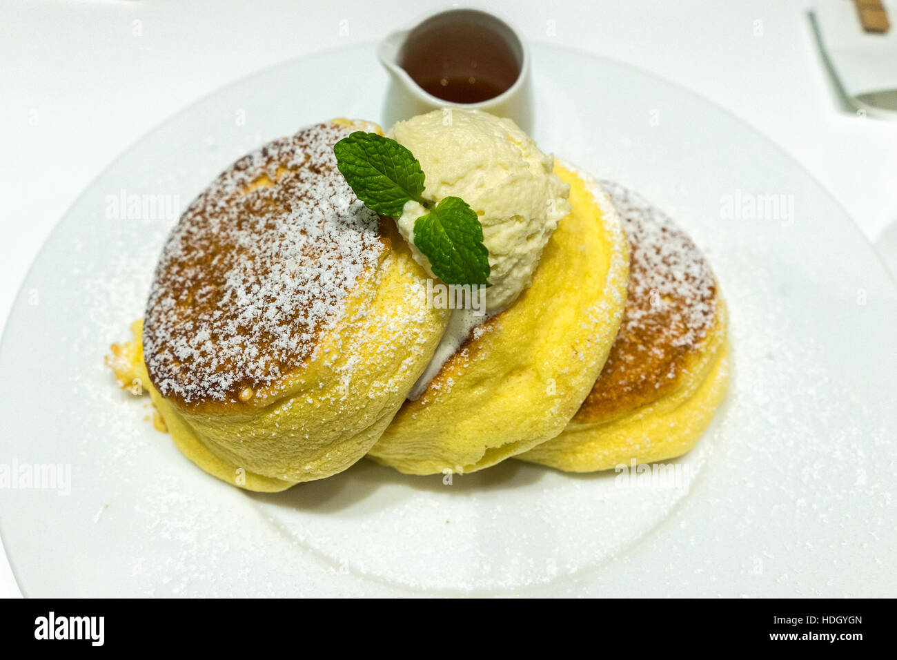 Fluffy Pancakes with Honey Syrup Stock Photo