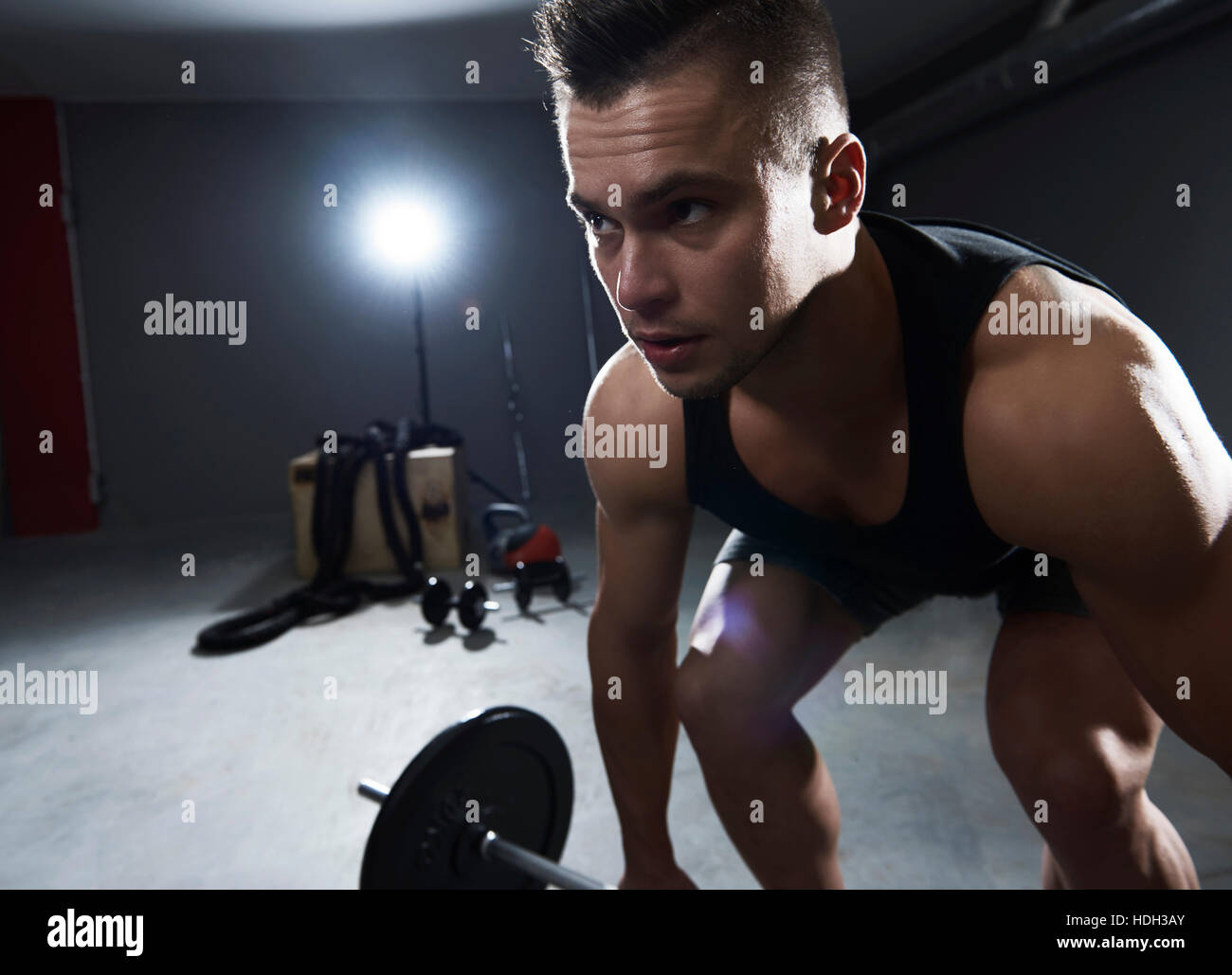 Weight lifting at the garage gym Stock Photo Alamy