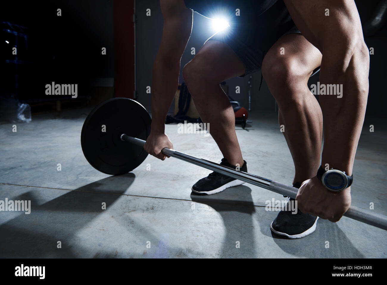 Dead lift made by athlete man Stock Photo