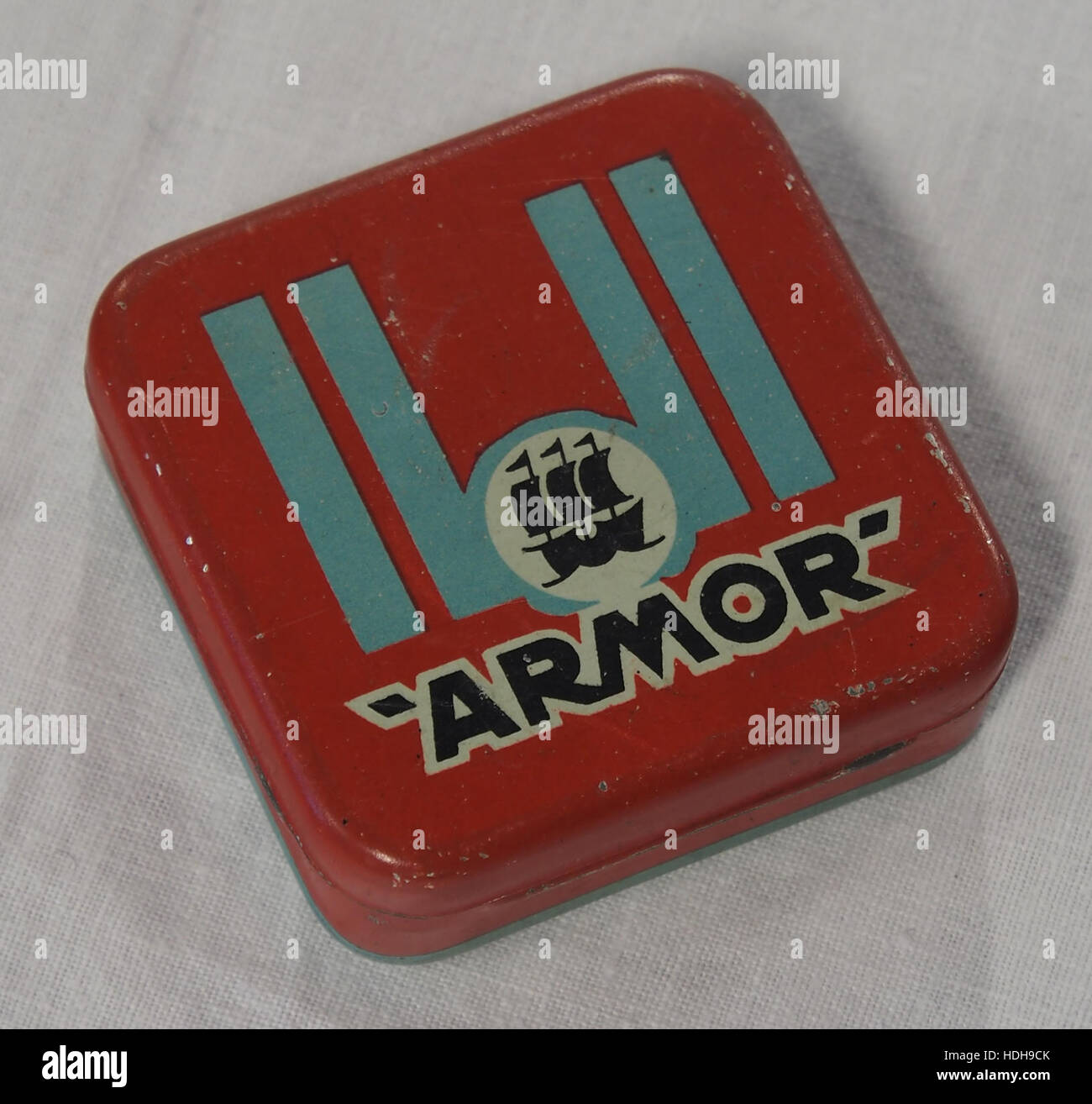 Tupperware Armor This image depicts a can of Armor, a brand associated with military ...