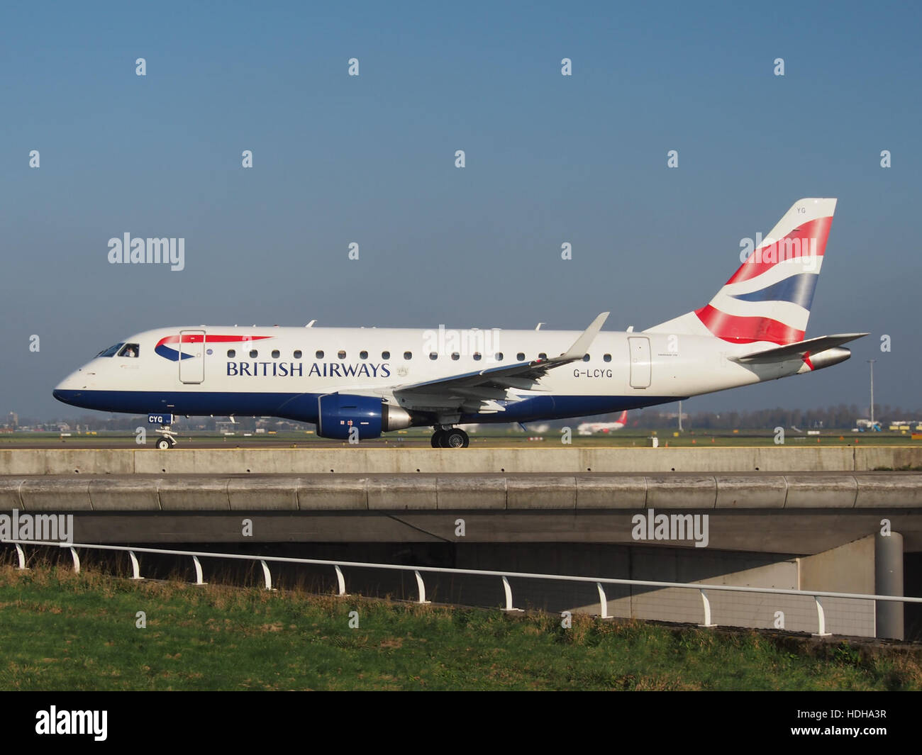 G-LCYG - Embraer ERJ-170STD - British Airways at Schiphol taxiing towards 36L pic4 Stock Photo