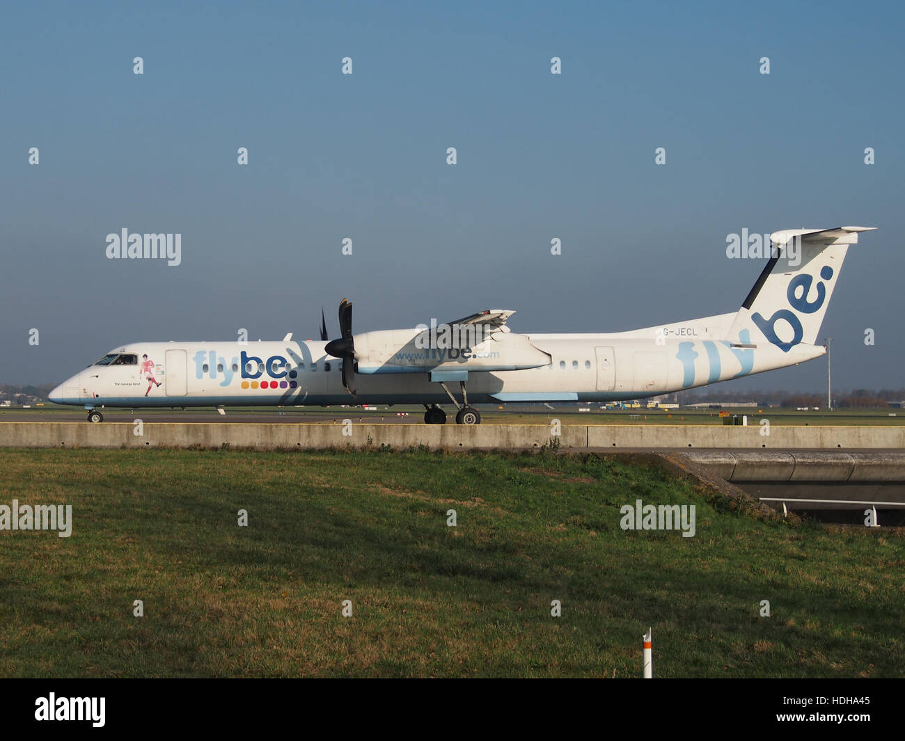 G-JECL Flybe De Havilland Canada DHC-8-402Q Dash 8 - cn 4114 at Schiphol taxiing towards runway 36L pic4 Stock Photo