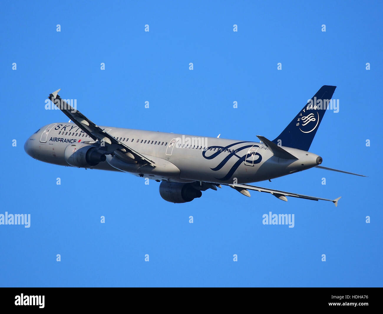 Air France Airbus A321-212 with registration F-GTAE takes off from Schiphol runway 36C. The aircraft, part of the A320 family, is known for its fuel efficiency and comfort on medium-range flights. Stock Photo