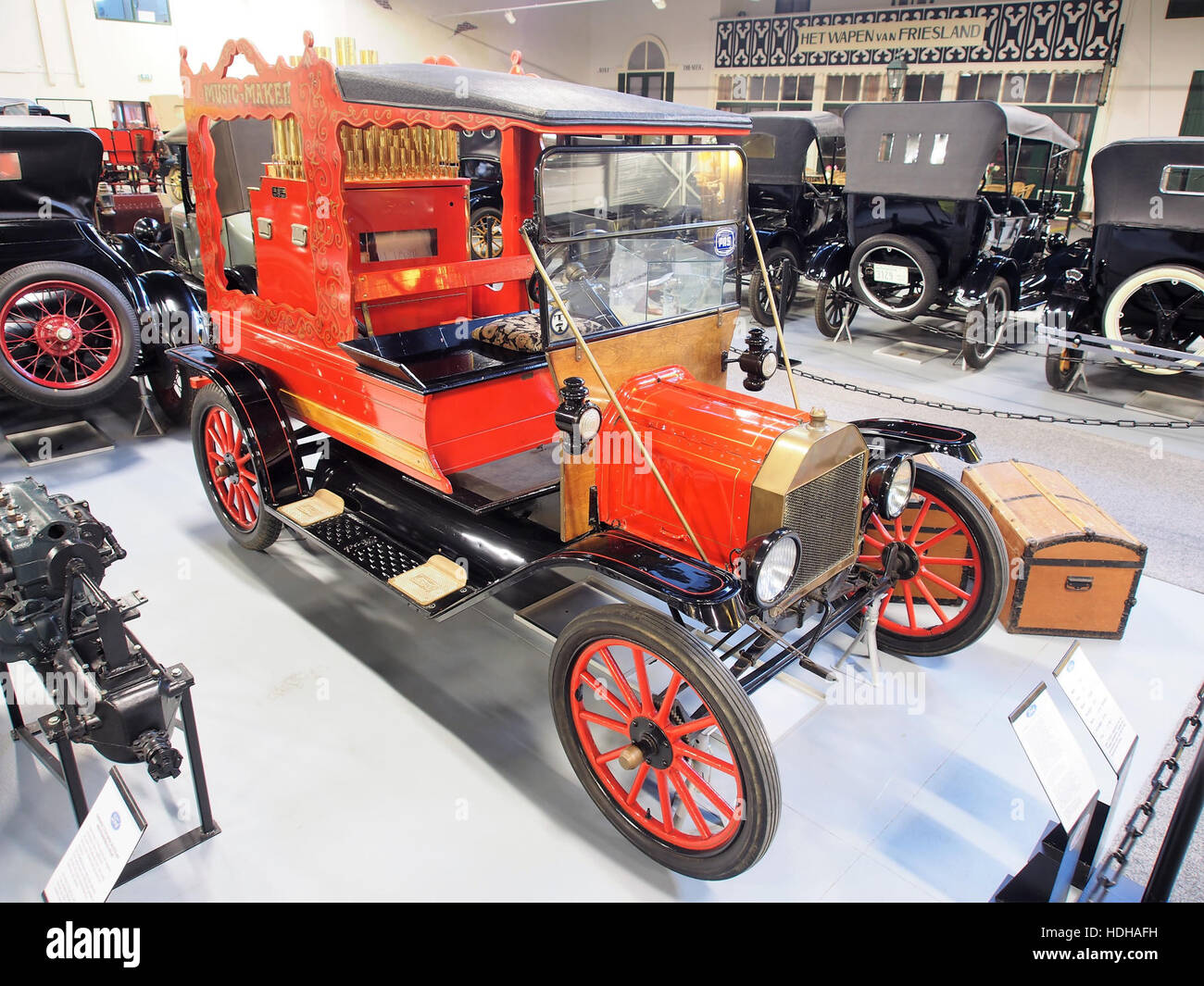 The 1916 Ford T with a Calliaphone organ is a unique historical combination of early 20th-century automotive and musical technology. The Ford Model T, known for its mass production, is paired with the Calliaphone organ, an early portable organ used for entertainment in the early 1900s. Stock Photo