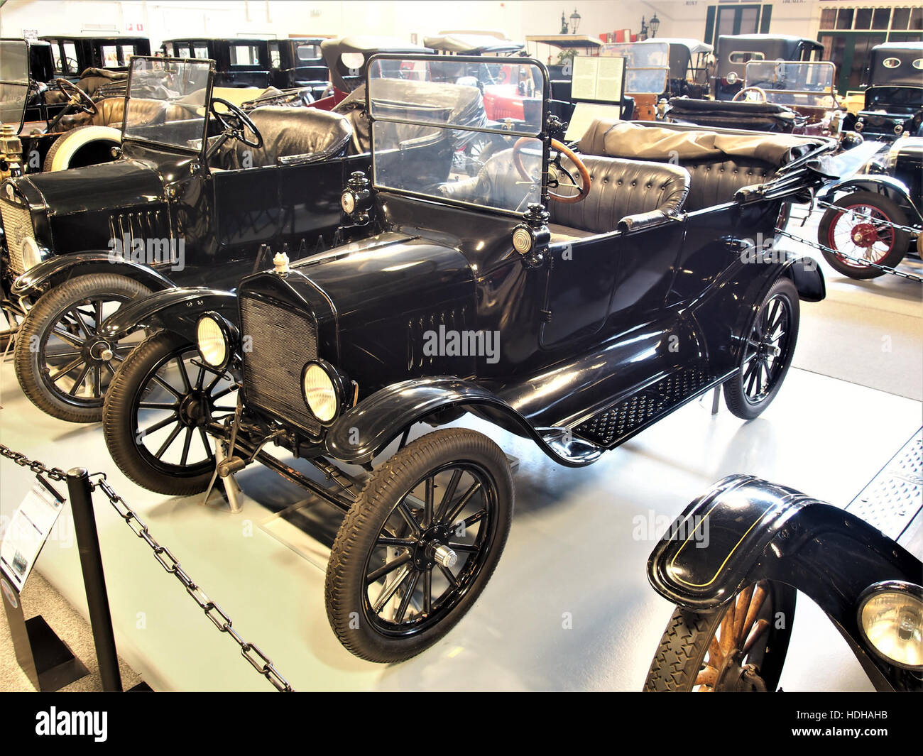 The 1916 Ford Model T Open Tourer is a classic American car, known for its accessibility and affordability. The open tourer variant features a convertible roof, reflecting the early days of mass automobile production in the United States. Stock Photo