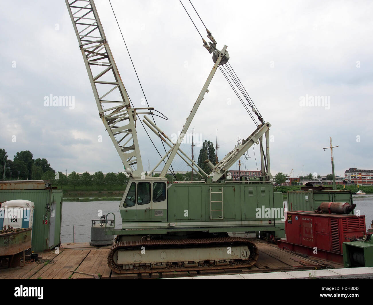 Green Weserhutte crane on a barge in Bremen pic2 Stock Photo