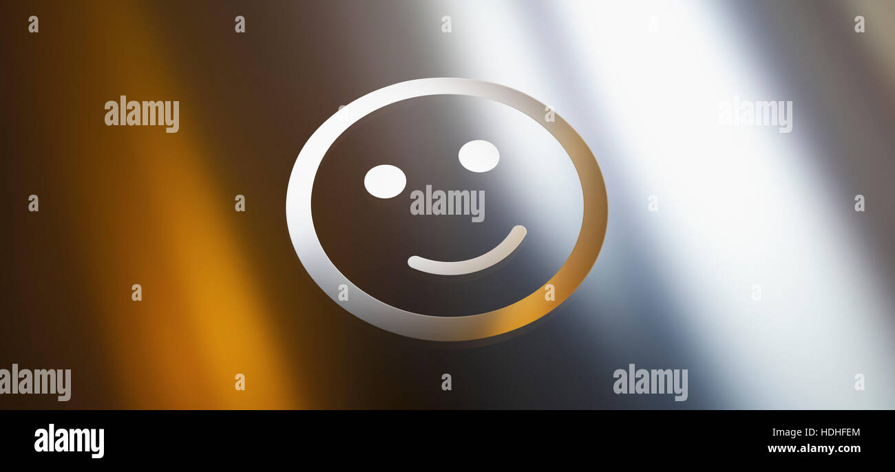 Close-up of smiley face against gray gradient background Stock Photo