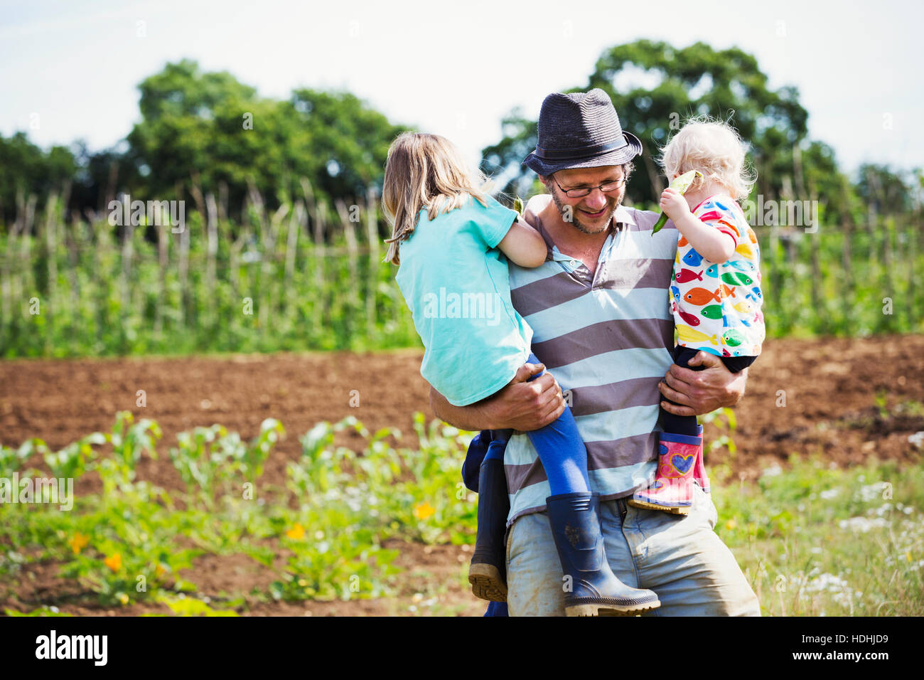 Man holding children hires stock photography and images Alamy