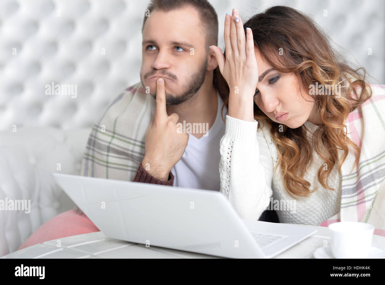 Young couple with laptop Stock Photo - Alamy