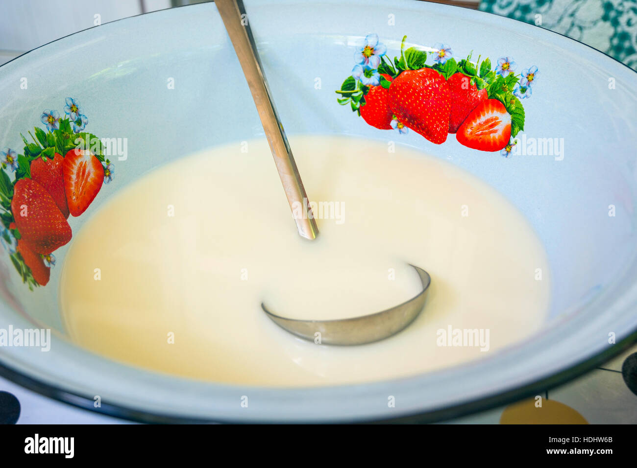 Kumis or kimis, fermented horse milk in old fashioned style bowl. Drink typical of central Asia Stock Photo