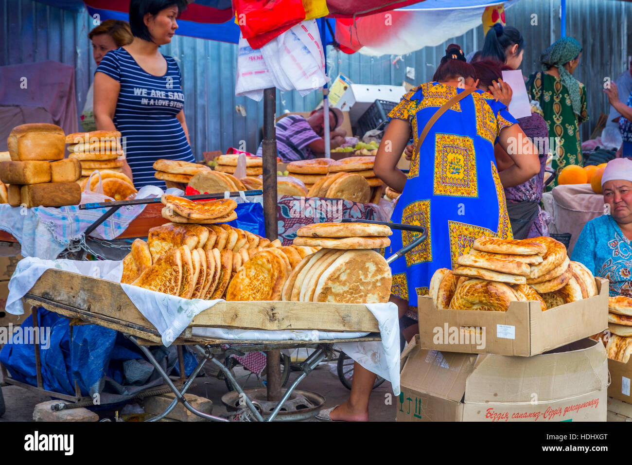 SHYMKENT, KAZAKHSTAN - JULY 19: Woman selling typical central asian ...