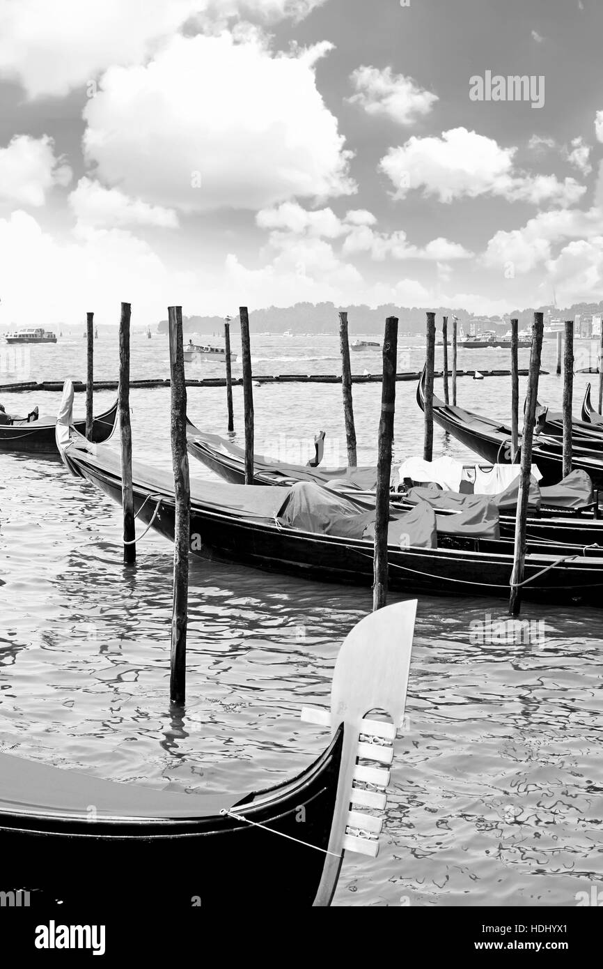 Gondolas near Doge's Palace, Venice, Italy. Black-white Stock Photo
