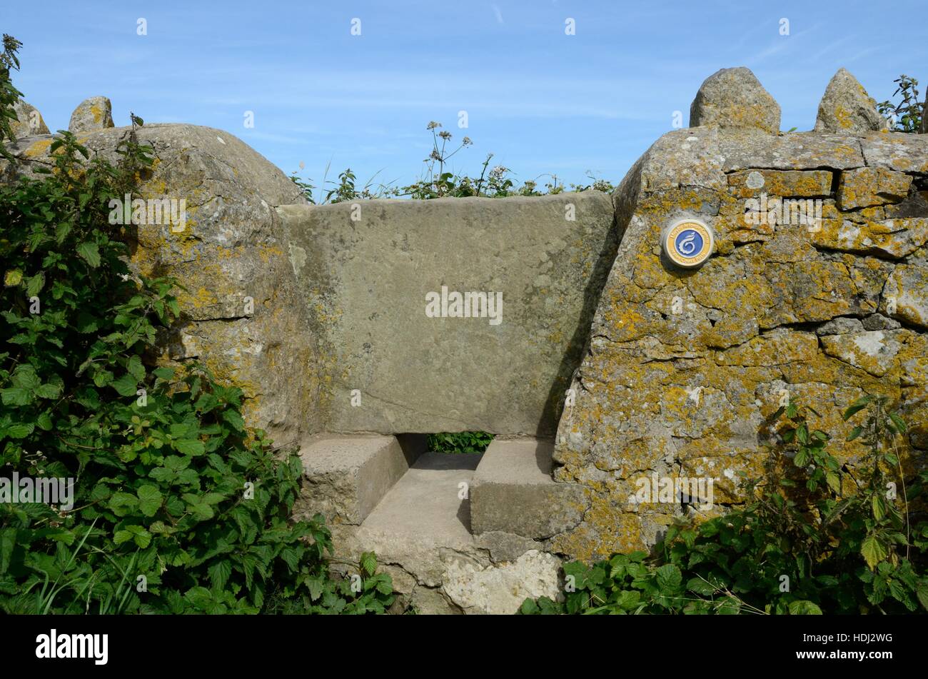 Wales Coast path sign on an old stone style Nash point Glamorgan Heritage Coast Wales Stock Photo