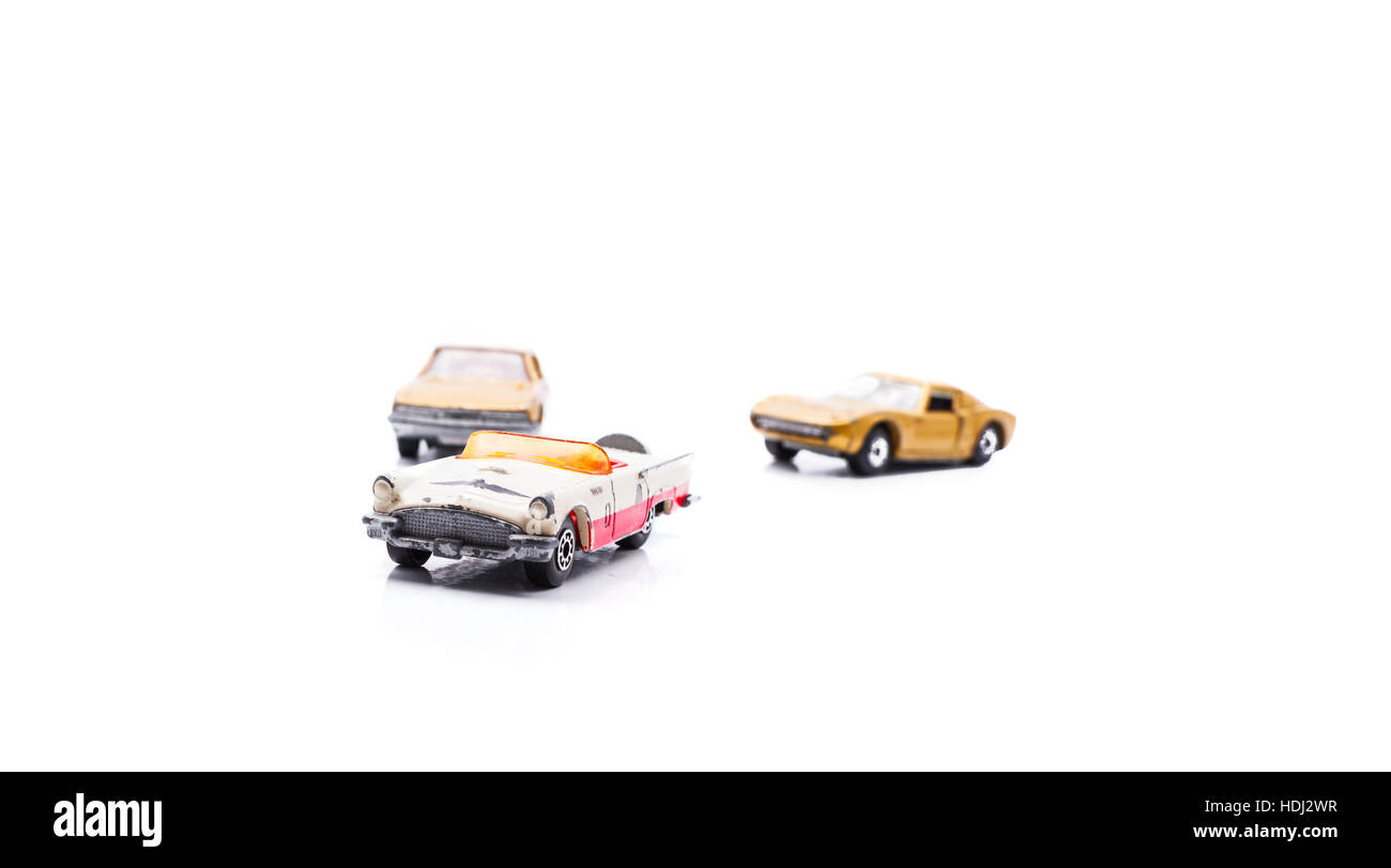 Various toy used retro toy cars isolated on white background Stock ...