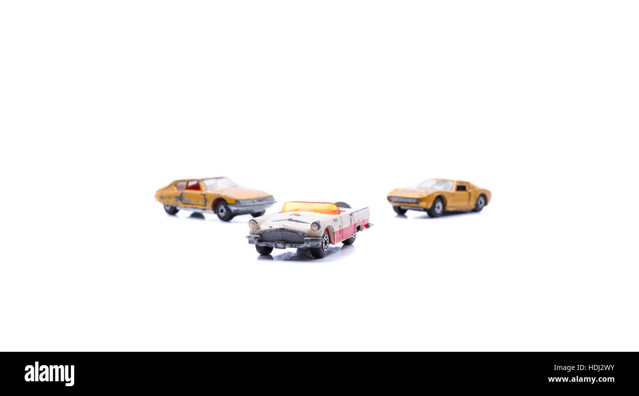 Various toy used retro toy cars isolated on white background Stock ...