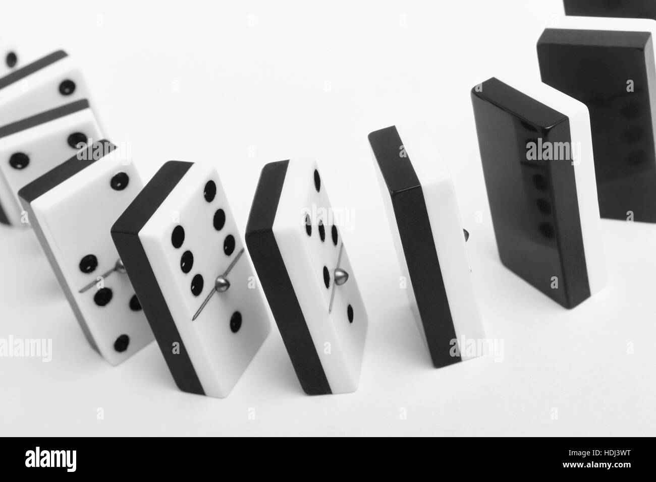 Black Dominoes game block on a colored background Stock Photo - Alamy