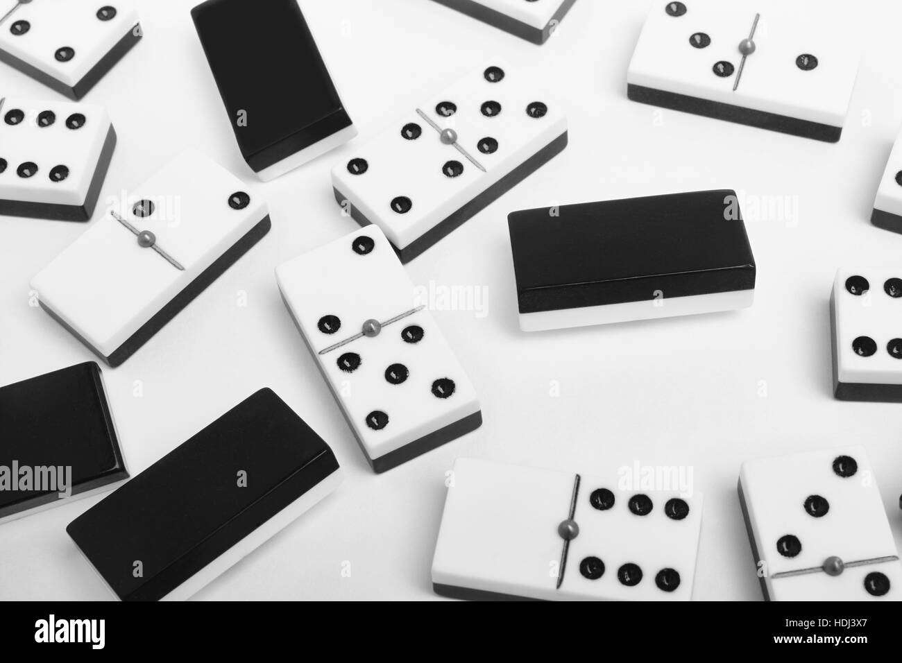 Domino Game With Pieces Over A White Background Black White