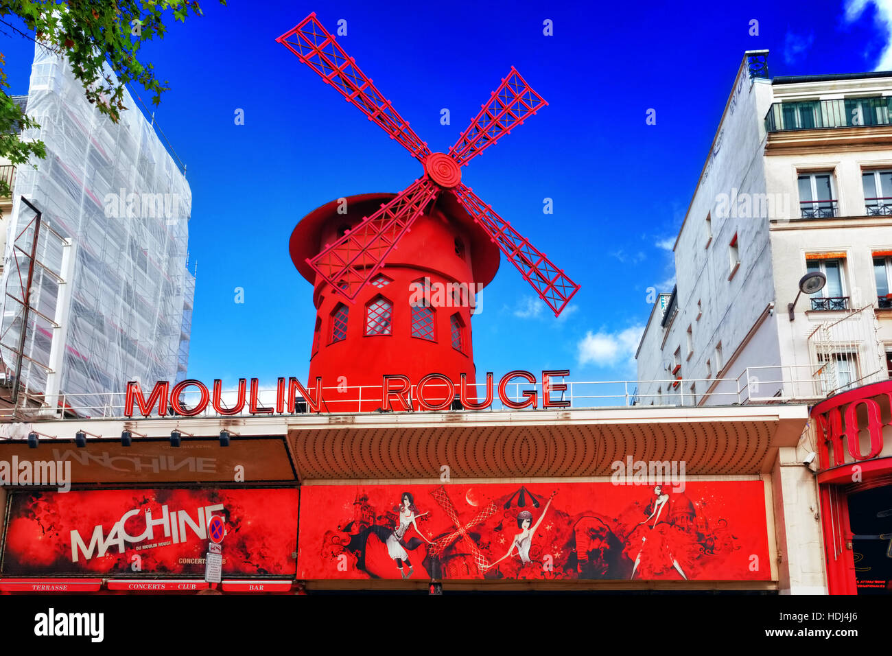 PARIS, FRANCE - SEPTEMBER 20: The Moulin Rouge during the day, on September 20, 2013 in Paris, France. Moulin Rouge is the most famous Parisian cabare Stock Photo
