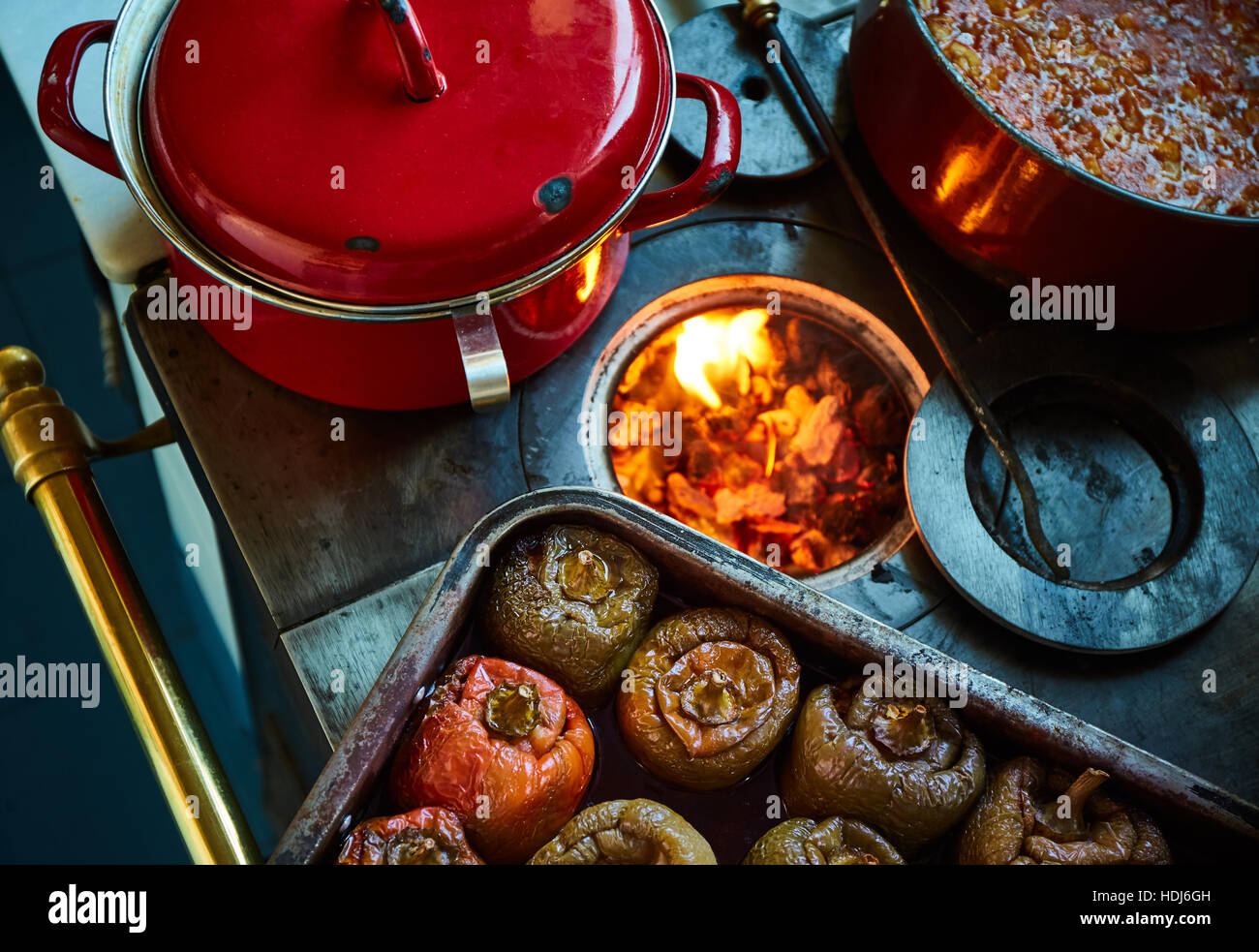 stuffed peppers over an old coal kitchen fired and other stews Stock Photo