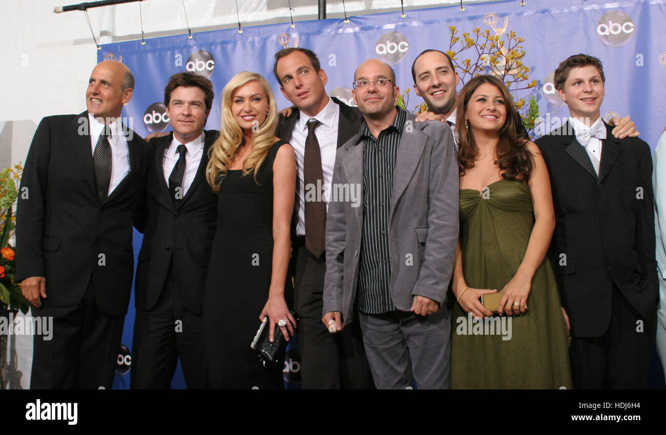 The cast from the Emmy winning television series 'Arrested Development' at the 56th Annual Emmy Awards  in Los Angeles, California on Sunday 19 September, 2004.  From left to right, Jeffrey Tambor, Jason Bateman, Portia de Rossi, Will Arnett, David Cross, Tony Hale, Alia Shawkat, and Michael Cera. Photo credit: Francis Specker Stock Photo