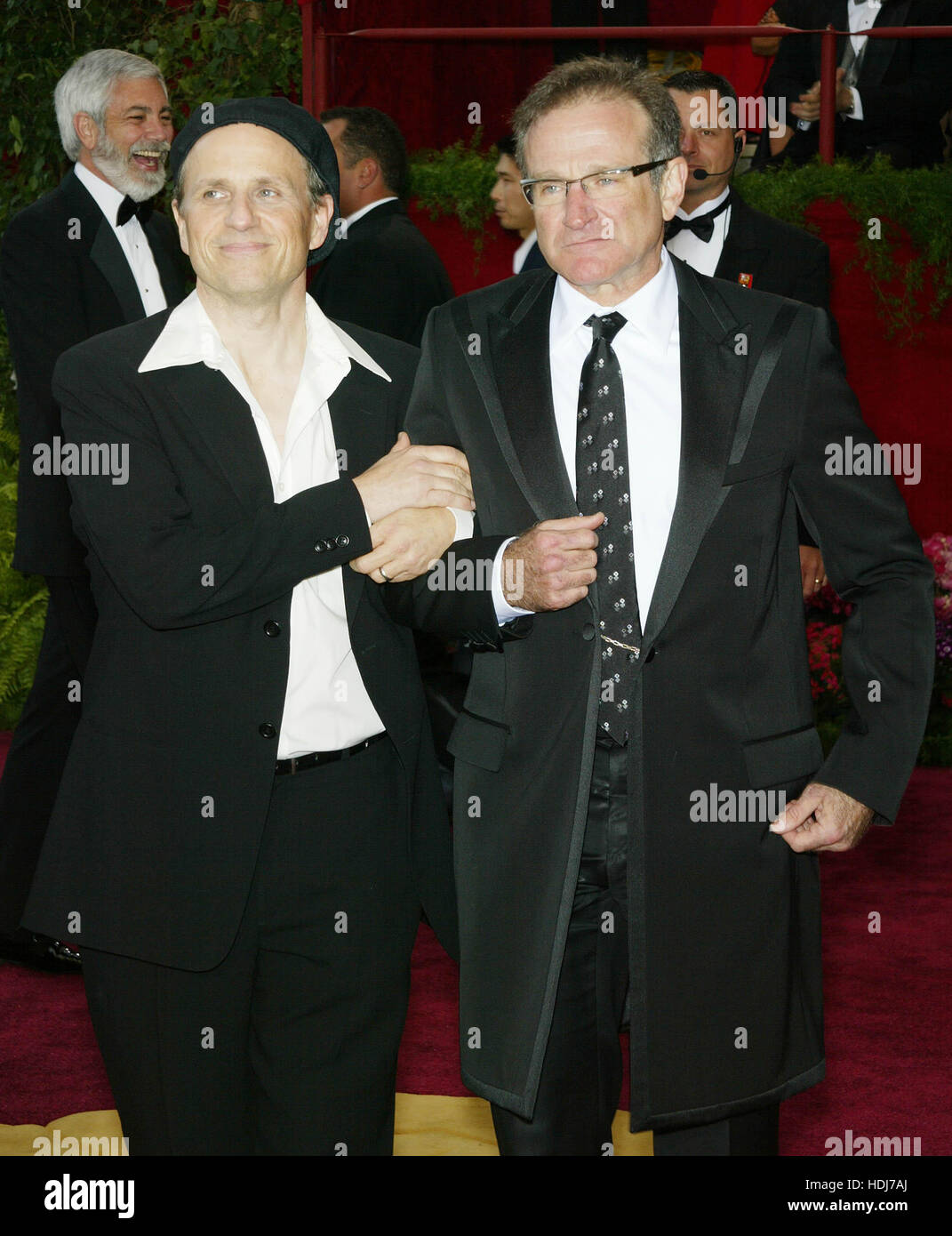 Actors Robin Williams (R) and Bobcat Goldthwait at the Academy Awards  in Hollywood,  California on February 29, 2004.  Photo credit: Francis Specker Stock Photo
