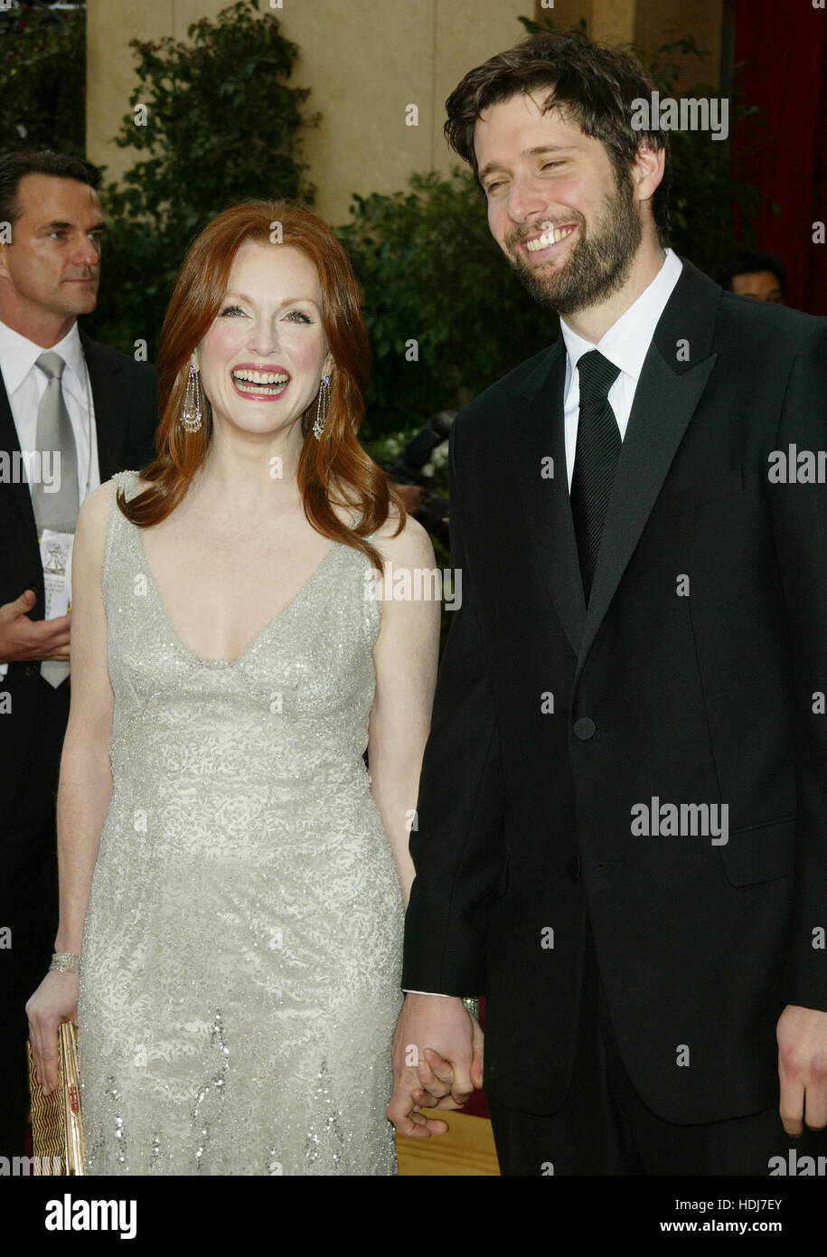 Julianne Moore and husband, director Bart Freundlich, at the Academy Awards  in Hollywood,  California on February 29, 2004.  Photo credit: Francis Specker Stock Photo