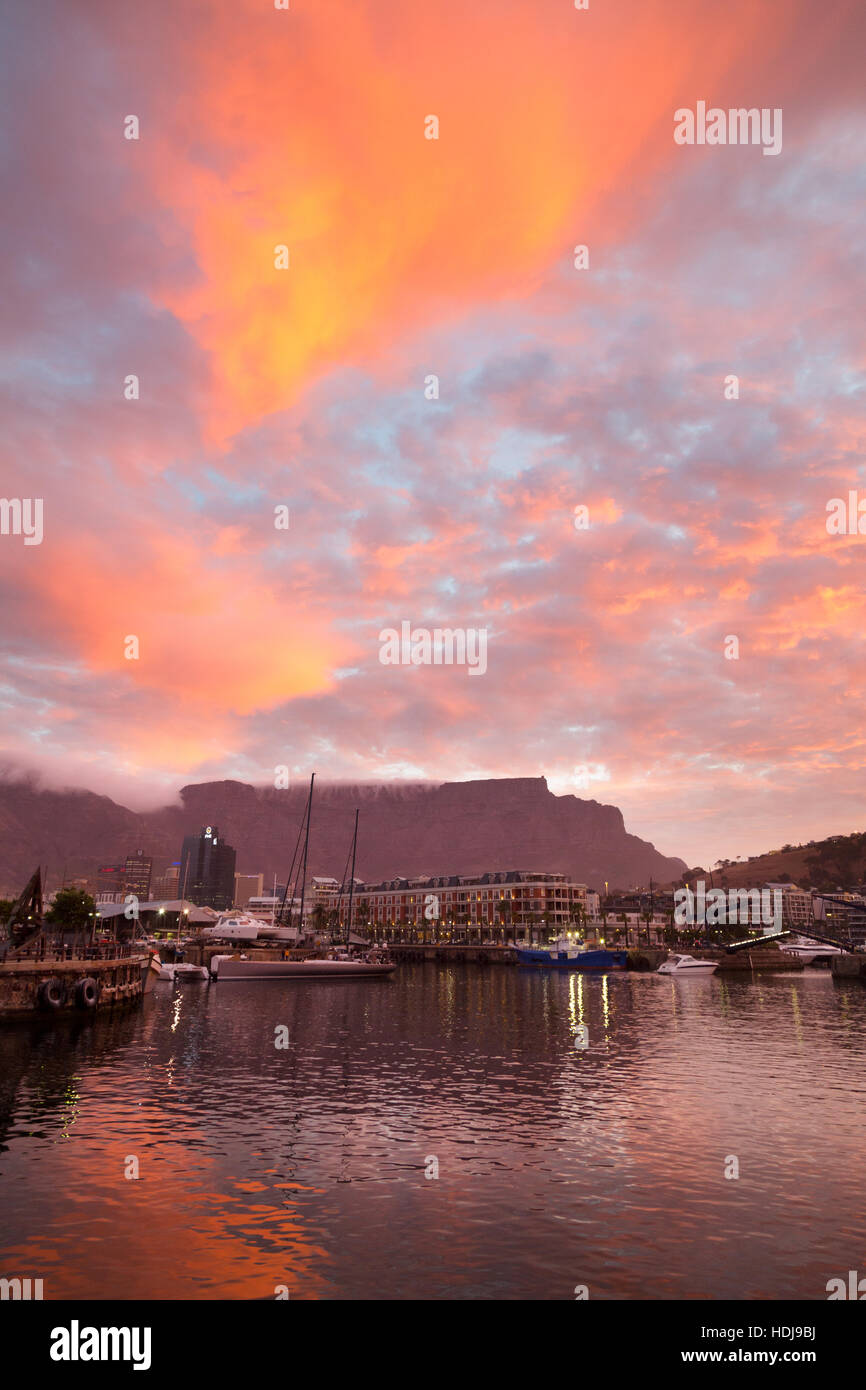 Colourful sunset over Cape Town Waterfront and Table Mountain, Cape Town, South Africa Stock Photo