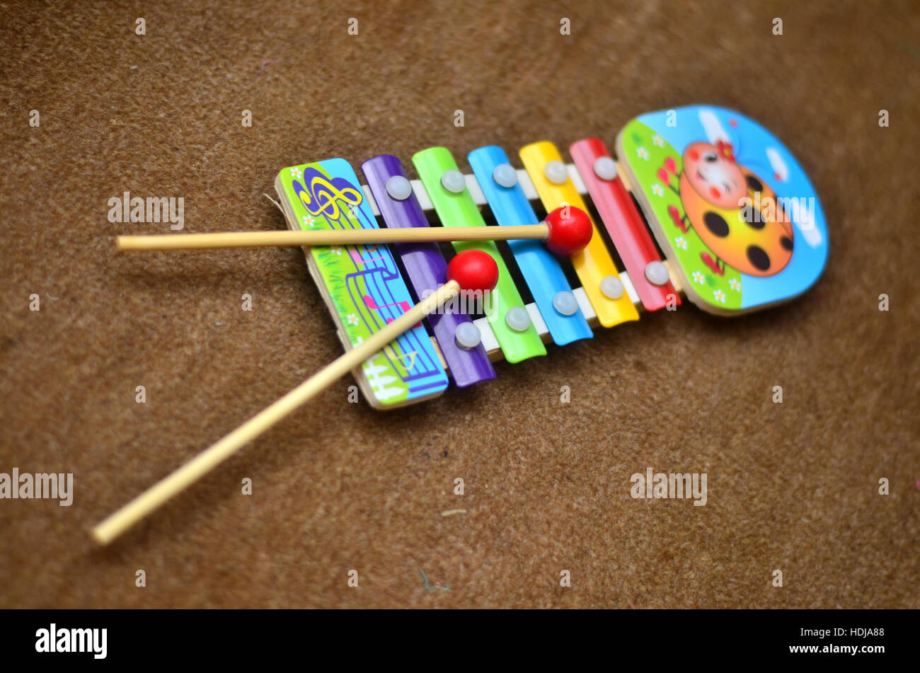 A Kid's Xylophone ready to be played by kids using sticks Stock Photo