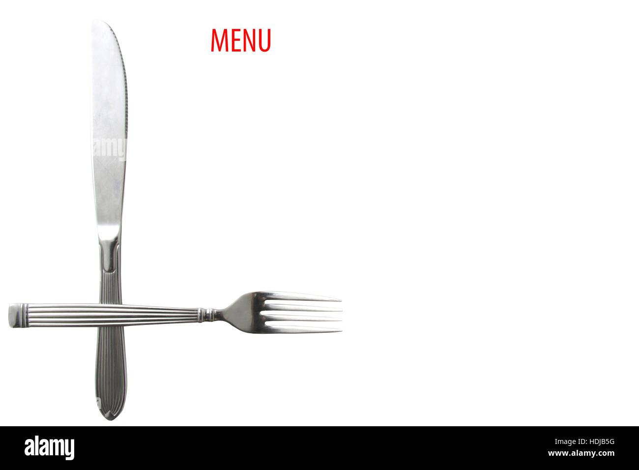 Silver knife and fork in position for menu isolated over white Stock