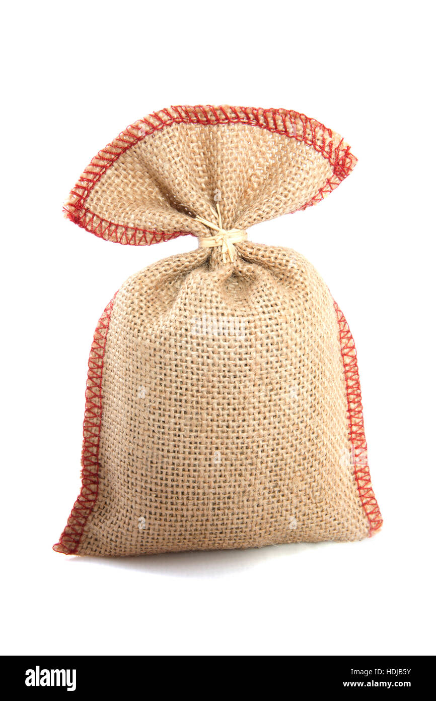 Jute bag filled with something isolated over white Stock Photo