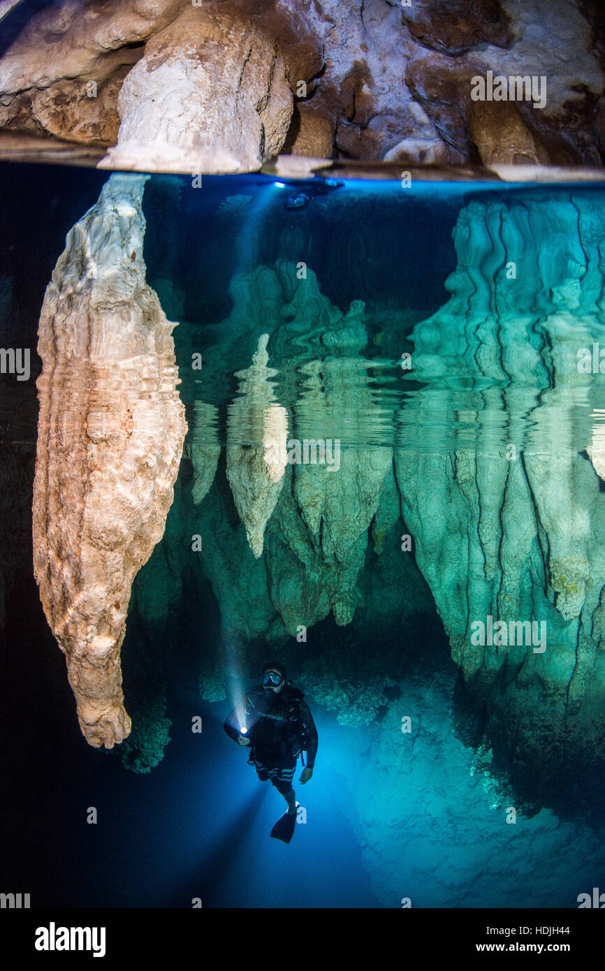 Scuba diver in Chandelier cave, Palau Stock Photo
