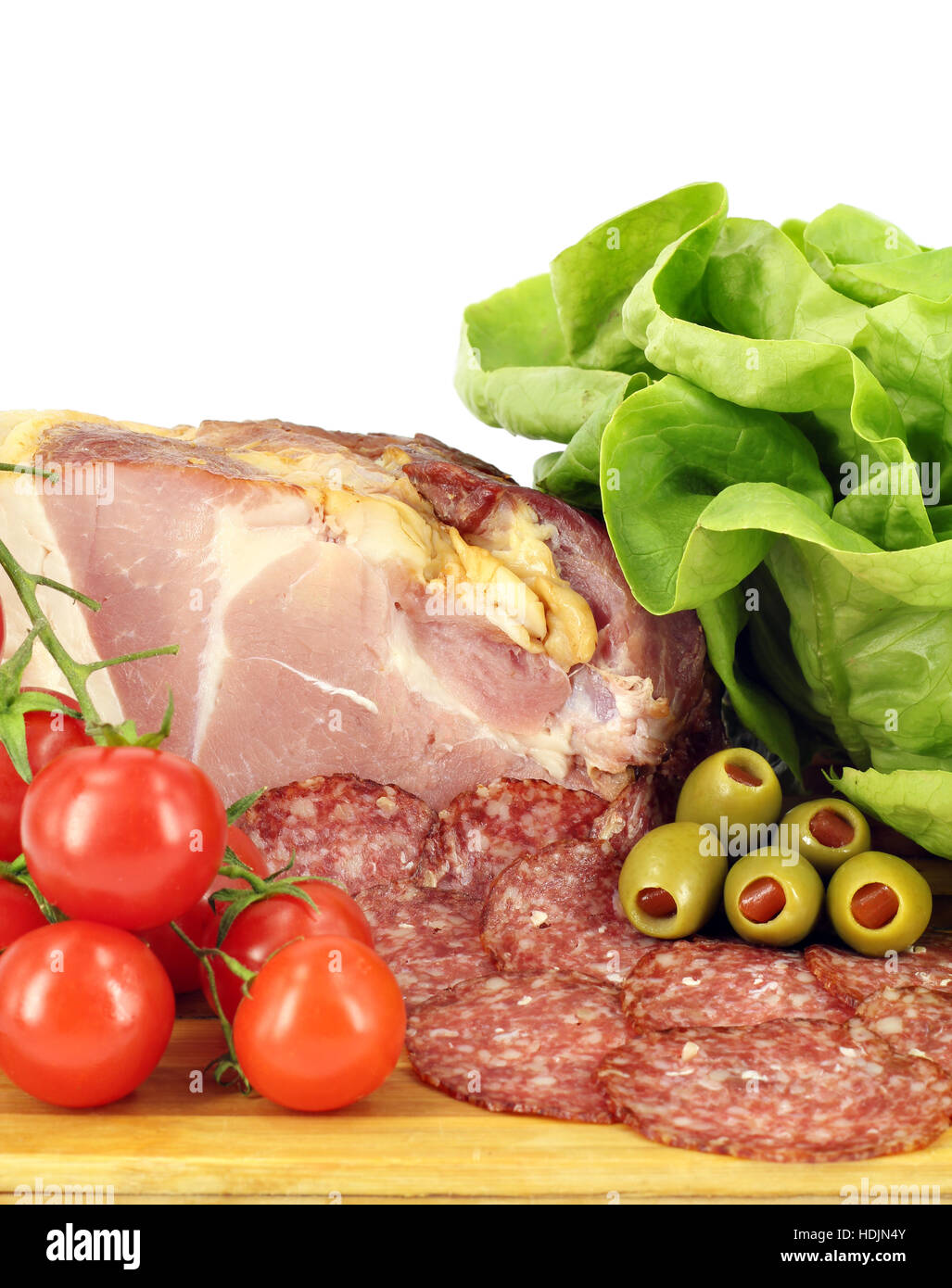 smoked ham salami tomatoes and olives Stock Photo