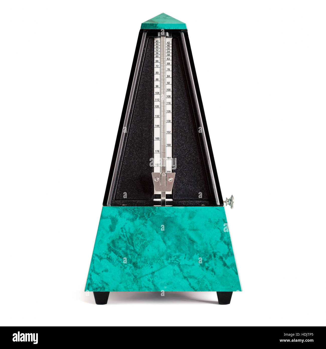 Stopped pyramid shaped metronome in plastic housing in sapphire green with marble effect Stock Photo